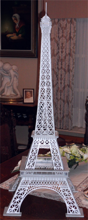 2 Tier Sculpted Eiffel Tower Chocolate Mud Cake Featuring Edible Letters  Notes And Postcards Top Is Constructed Using Flat Pieces Of Stenc 