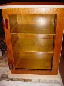 wooden scroll saw security box with the shelves once finished with varnish
