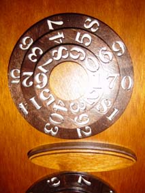 wooden numbered wheels of the scroll saw security box