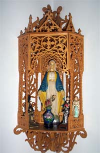 fretwork wooden hanging chapel with virgin mary and adornments